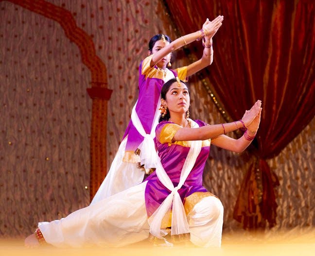 Noopur dancers performing a synchronized classical dance