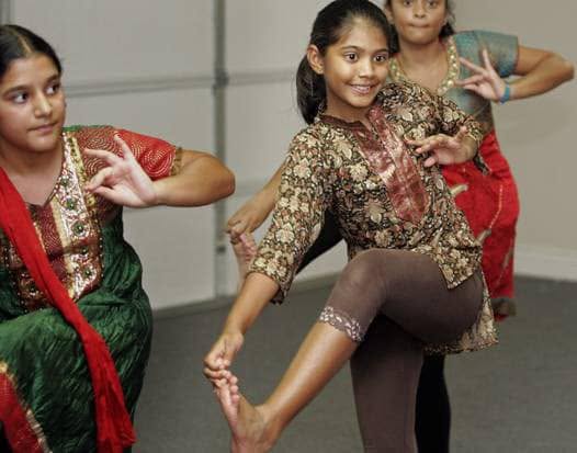 Noopur Dance Academy students practicing Indian dance in class